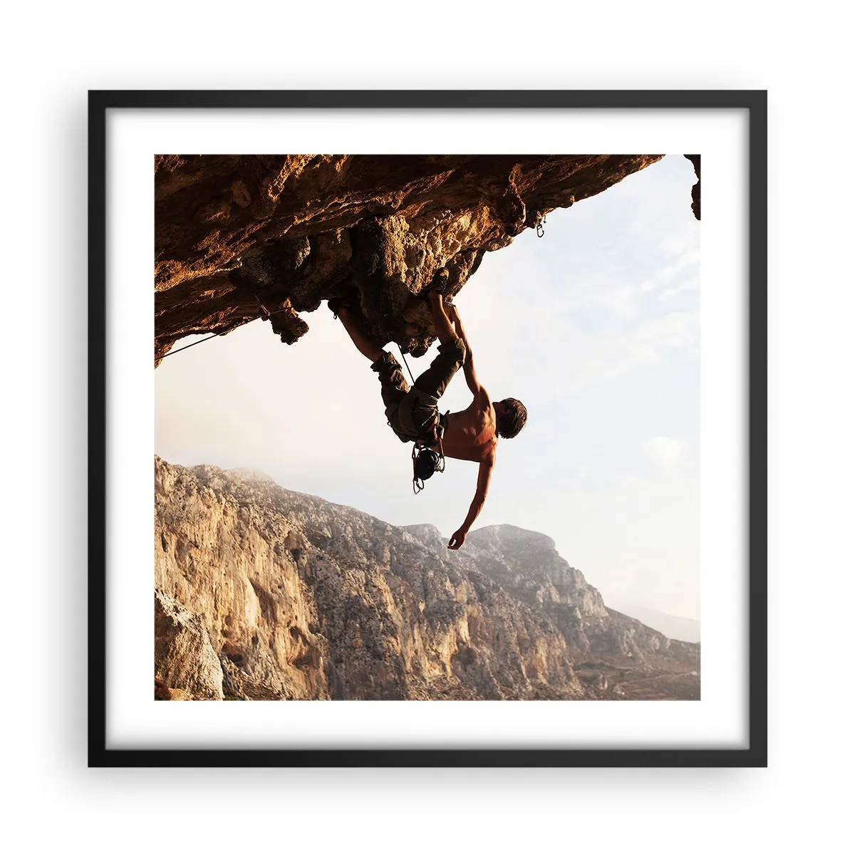 Poster in cornice nera - Il mondo ristretto in una mano sul bordo del masso - 50x50 cm