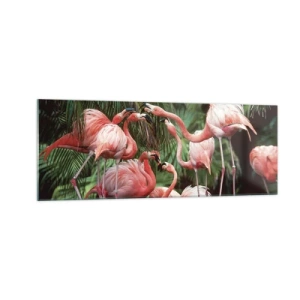 Quadro su vetro - Un gruppo di fenicotteri in un ambiente tropicale circondato da palme - 140x50cm - Pettegolezzi pomeridiani - Decorazione murale moderna per soggiorno e camera da letto ARTTOR