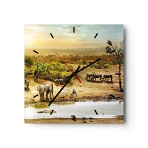 Orologio da parete - Orologio in Vetro - Elefanti e animali selvatici in una pozza d'acqua al tramonto - 30x30cm - "Un fiume usciva da Eden…" - Decorazione murale moderna per soggiorno e camera da letto ARTTOR