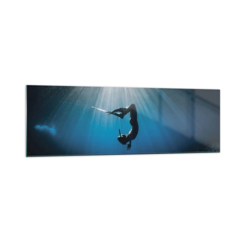 Quadro su vetro - Un subacqueo che galleggia in un raggio di luce sott'acqua - 160x50cm - Danza subacquea - Decorazione murale moderna per soggiorno e camera da letto ARTTOR