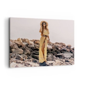 Quadro su tela - Stampe su Tela - Una donna in stile boho sullo sfondo di una spiaggia rocciosa - 100x70cm - La magia delle pietre - Decorazione murale moderna per soggiorno e camera da letto ARTTOR