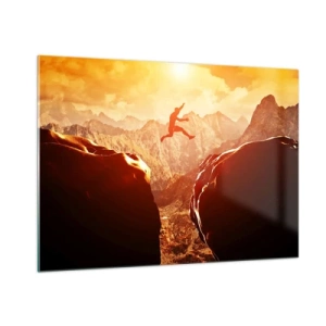 Quadro su vetro - Saltare un abisso in un paesaggio montano al tramonto - 100x70cm - Superare i confini - Decorazione murale moderna per soggiorno e camera da letto ARTTOR