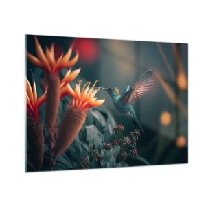 Quadro su vetro - Un colibrì volteggia tra le foglie sopra fiori esotici. - 70x50cm - Una vita davvero a colori - Decorazione murale moderna per soggiorno e camera da letto ARTTOR