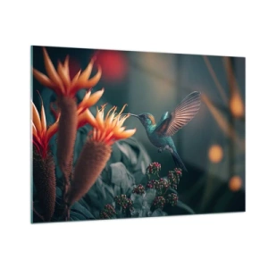 Quadro su vetro - Un colibrì volteggia tra le foglie sopra fiori esotici. - 100x70cm - Una vita davvero a colori - Decorazione murale moderna per soggiorno e camera da letto ARTTOR