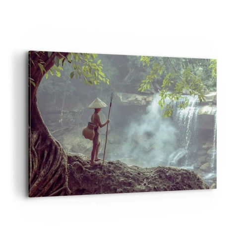 Quadro su tela - Stampe su Tela - Una figura con una lancia presso una cascata in una foresta tropicale - 120x80cm - In armonia con la natura - Decorazione murale moderna per soggiorno e camera da letto ARTTOR
