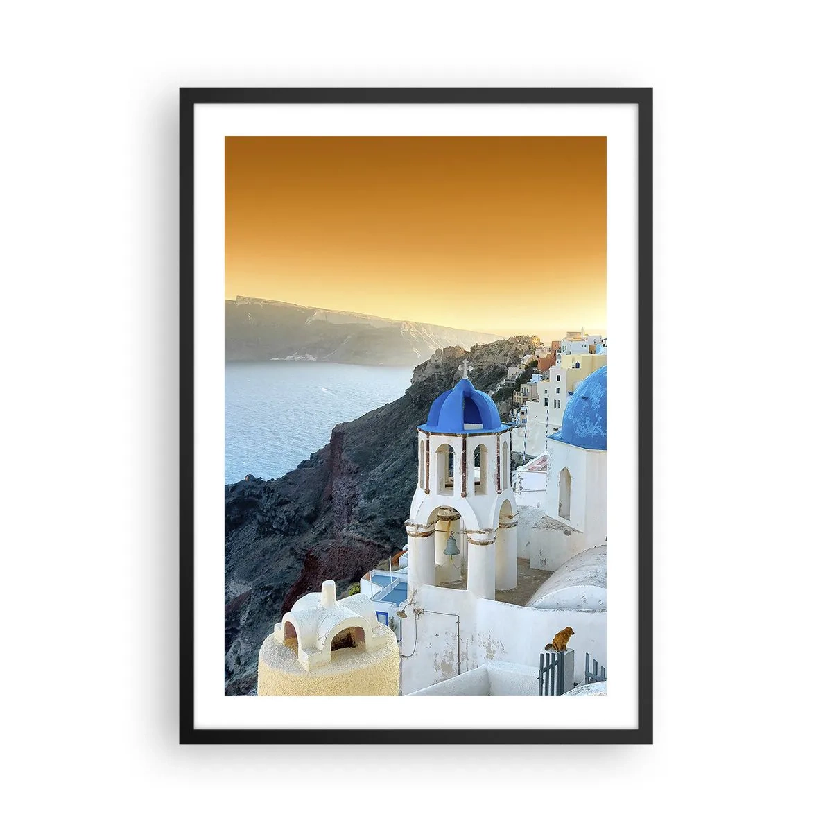 Poster in cornice nera - Santorini con le sue case bianche e le cupole blu - 50x70cm - Santorini: aggrappate alle rocce - Decorazione murale moderna per soggiorno e camera da letto ARTTOR
