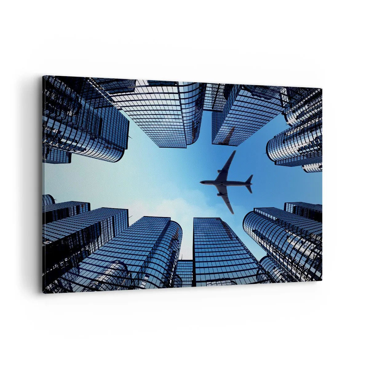 Quadro su tela - Stampe su Tela - Un aereo che sorvola i moderni grattacieli del centro città. - 120x80cm - Panorama dal canyon di vetro - Decorazione murale moderna per soggiorno e camera da letto ARTTOR