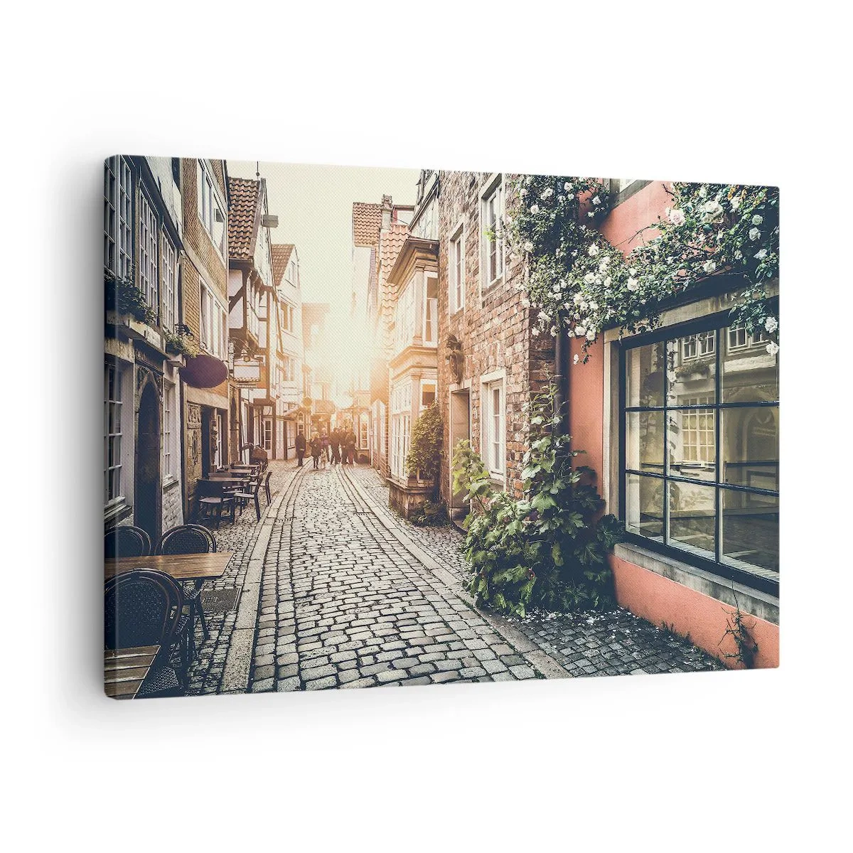 Quadro su tela - Stampe su Tela - Una strada affascinante con pavimentazione in pietra e fiori - 70x50cm - L'angolo delle rose nella luce rosata - Decorazione murale moderna per soggiorno e camera da letto ARTTOR
