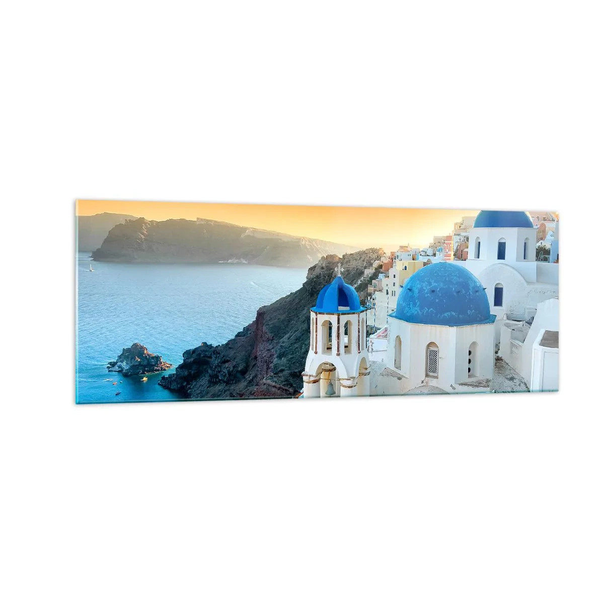 Quadro su vetro - Vista di Santorini con edifici bianchi e mare blu - 140x50cm - Santorini: aggrappate alle rocce - Decorazione murale moderna per soggiorno e camera da letto ARTTOR