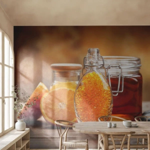Fotomurali Premium Sand - Il gusto e l'aroma del sole - Gastronomia, Arancia, Vaso Con Miele - 450x315 cm