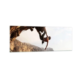 Quadro su vetro - Uno scalatore su una ripida scogliera in montagna sotto il sole - 140x50cm - Il mondo ristretto in una mano sul bordo del masso - Decorazione murale moderna per soggiorno e camera da letto ARTTOR