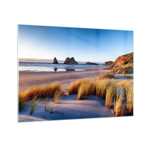 Quadro su vetro - Una spiaggia all'alba con erba e rocce sullo sfondo e un mare calmo - 70x50cm - Per i cercatori di pace - Decorazione murale moderna per soggiorno e camera da letto ARTTOR