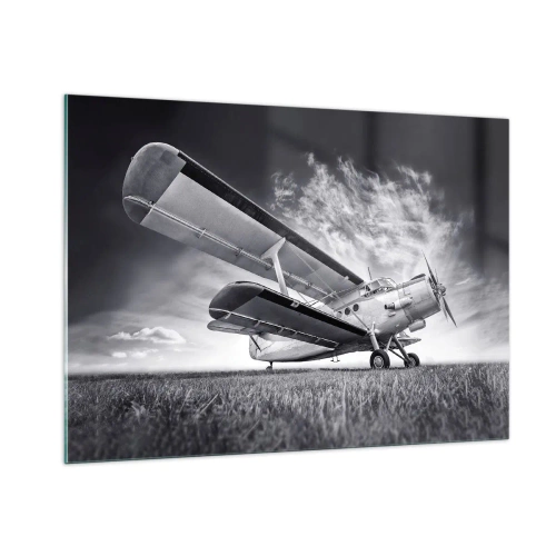 Quadro su vetro - Una fotografia in bianco e nero di un aereo contro un cielo spettacolare. - 100x70cm - Giramondo alato - Decorazione murale moderna per soggiorno e camera da letto ARTTOR