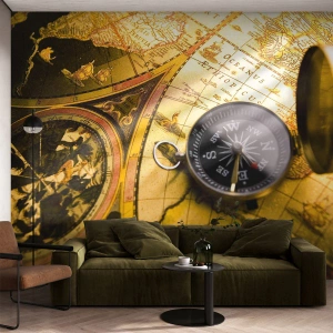 Fotomurali Premium Sand - Bussola antica su una mappa del mondo dorata - 100x70cm - Forse all'estremità del mondo? - Decorazione murale moderna per soggiorno e camera da letto ARTTOR