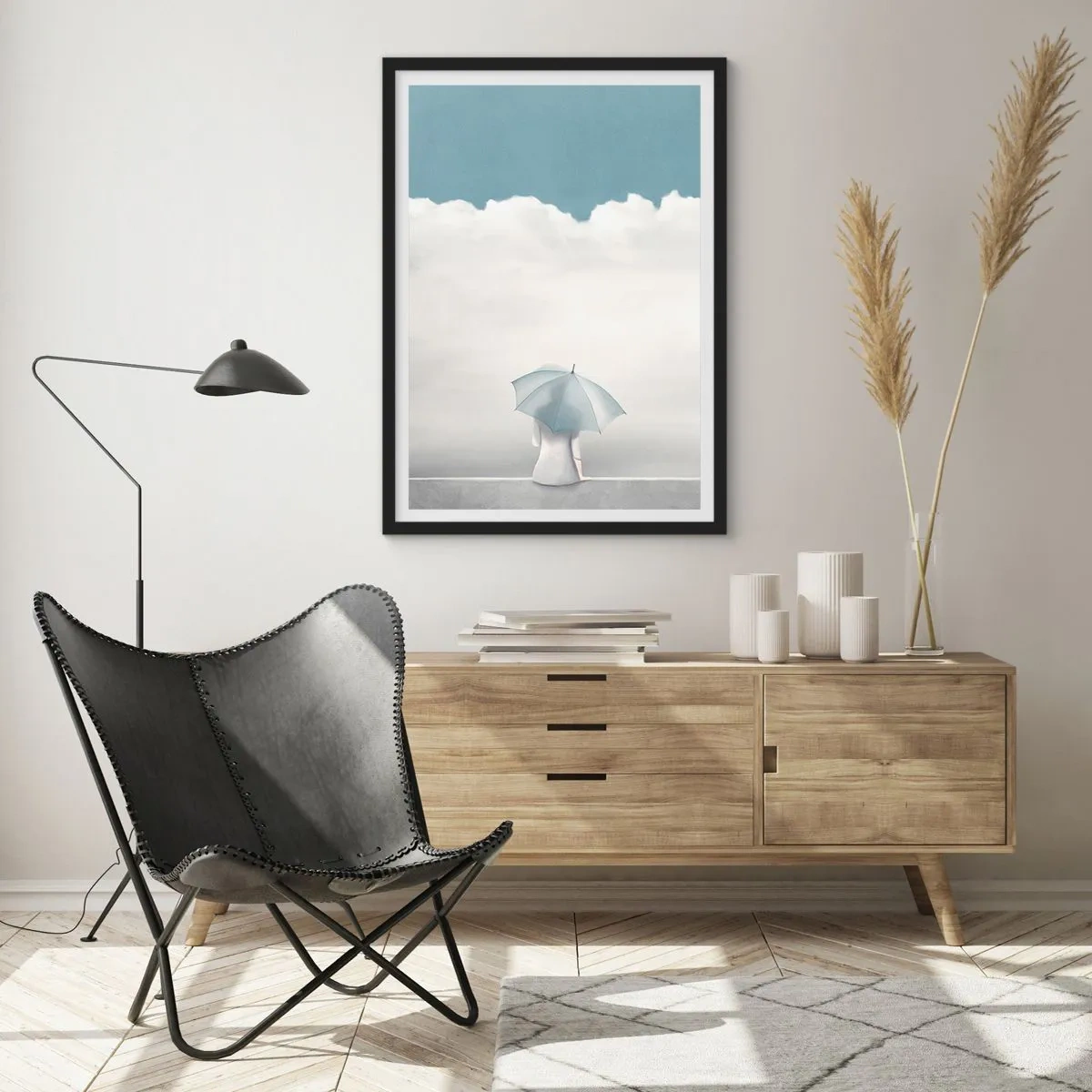 Poster in cornice nera - Una figura con un ombrello seduta su una sporgenza tra le nuvole - 50x70cm - Al confine tra sonno e veglia - Decorazione murale moderna per soggiorno e camera da letto ARTTOR