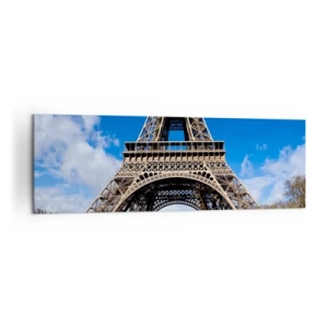 Quadro su tela - Stampe su Tela - La Torre Eiffel sullo sfondo di un cielo azzurro e di un parco verde - 160x50cm - Tutta Parigi ai suoi piedi - Decorazione murale moderna per soggiorno e camera da letto ARTTOR