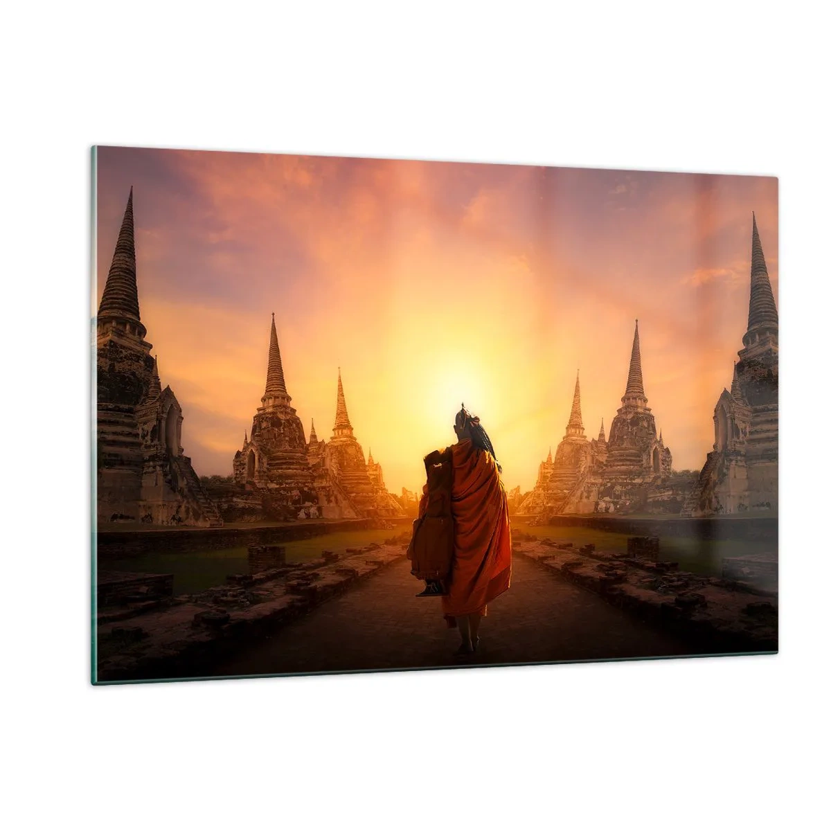 Quadro su vetro - Un monaco sullo sfondo del tramonto e dei templi in Asia - 120x80cm - In pace per l'eternità - Decorazione murale moderna per soggiorno e camera da letto ARTTOR