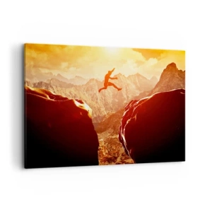 Quadro su tela - Stampe su Tela - Una figura che salta tra le rocce con le montagne sullo sfondo - 100x70cm - Superare i confini - Decorazione murale moderna per soggiorno e camera da letto ARTTOR