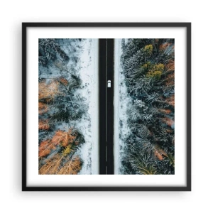 Poster in cornice nera - Tagliando la foresta invernale - 50x50 cm