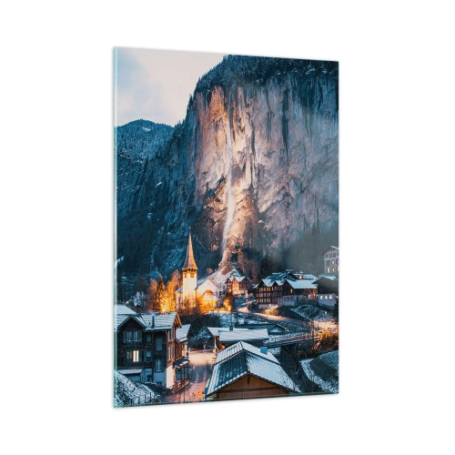 Quadro su vetro - Un villaggio invernale ai piedi di una parete rocciosa illuminata - 50x70cm - Lo spirito luminoso dell'inverno - Decorazione murale moderna per soggiorno e camera da letto ARTTOR