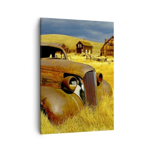 Quadro su tela - Stampe su Tela - Una vecchia macchina arrugginita sullo sfondo di capanne di legno abbandonate - 50x70cm - Meritato riposo - Decorazione murale moderna per soggiorno e camera da letto ARTTOR