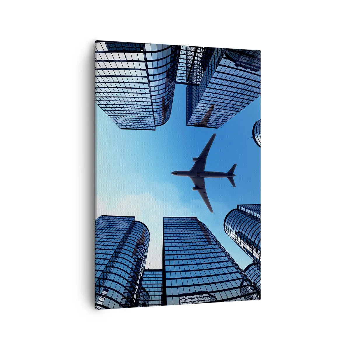 Quadro su tela - Stampe su Tela - Un aereo che sorvola i moderni grattacieli del centro città. - 70x100cm - Panorama dal canyon di vetro - Decorazione murale moderna per soggiorno e camera da letto ARTTOR