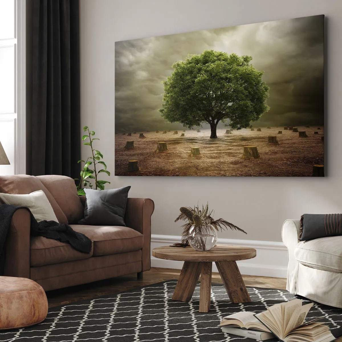 Quadro su tela - Stampe su Tela - Un albero verde circondato da tronchi d'albero abbattuti contro un cielo nuvoloso - 70x50cm - Ogni speranza - Decorazione murale moderna per soggiorno e camera da letto ARTTOR