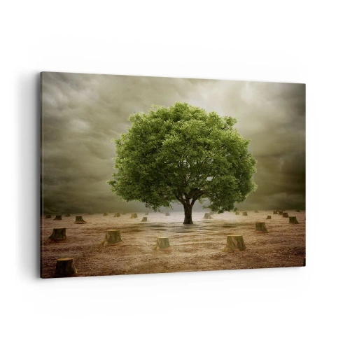 Quadro su tela - Stampe su Tela - Un albero verde circondato da tronchi d'albero abbattuti contro un cielo nuvoloso - 100x70cm - Ogni speranza - Decorazione murale moderna per soggiorno e camera da letto ARTTOR