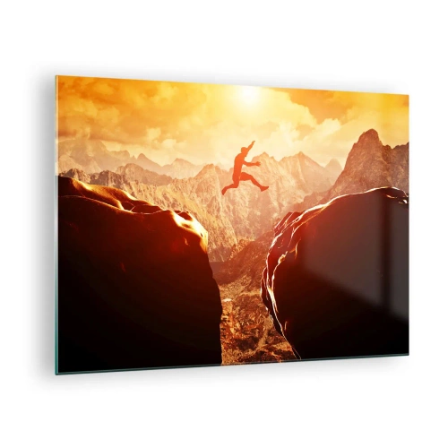 Quadro su vetro - Saltare un abisso in un paesaggio montano al tramonto - 70x50cm - Superare i confini - Decorazione murale moderna per soggiorno e camera da letto ARTTOR