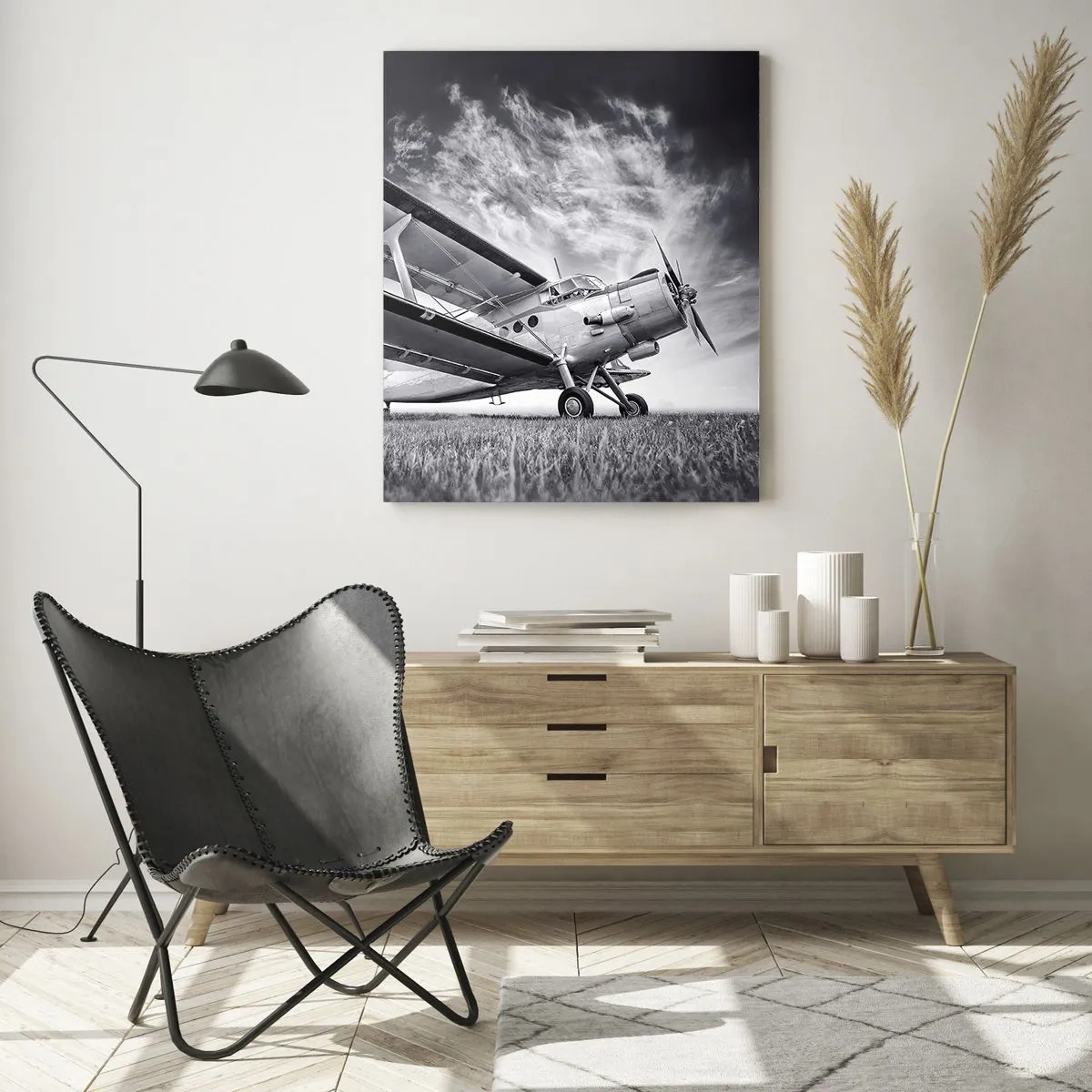 Quadro su vetro - Un aereo contro un cielo drammatico in bianco e nero - 70x100cm - Giramondo alato - Decorazione murale moderna per soggiorno e camera da letto ARTTOR