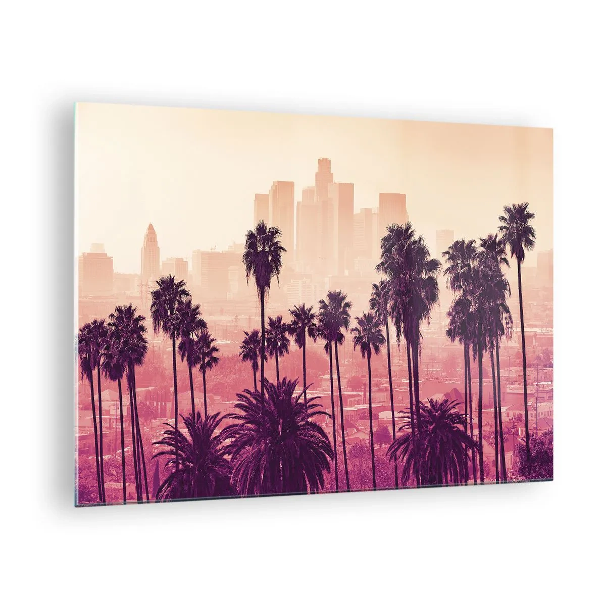 Quadro su vetro - Palme sullo sfondo dello skyline della città nei toni caldi del tramonto - 70x50cm - Paesaggio della California - Decorazione murale moderna per soggiorno e camera da letto ARTTOR