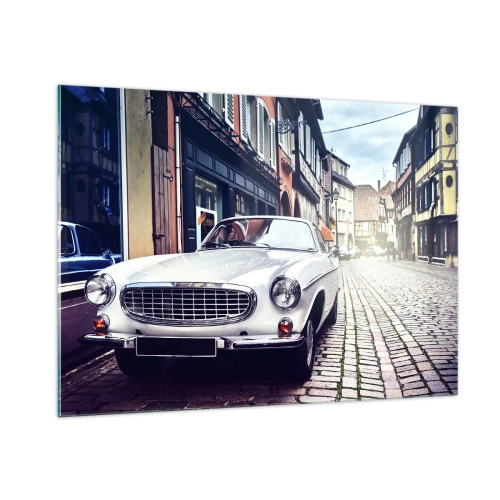 Quadro su vetro - Un'auto classica bianca sullo sfondo di edifici storici - 100x70cm - Il passato è oggi - Decorazione murale moderna per soggiorno e camera da letto ARTTOR