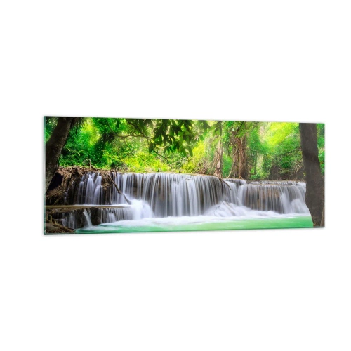 Quadro su vetro - Una cascata verde circondata da una fitta vegetazione tropicale - 140x50cm - Cascata nel verde - Decorazione murale moderna per soggiorno e camera da letto ARTTOR