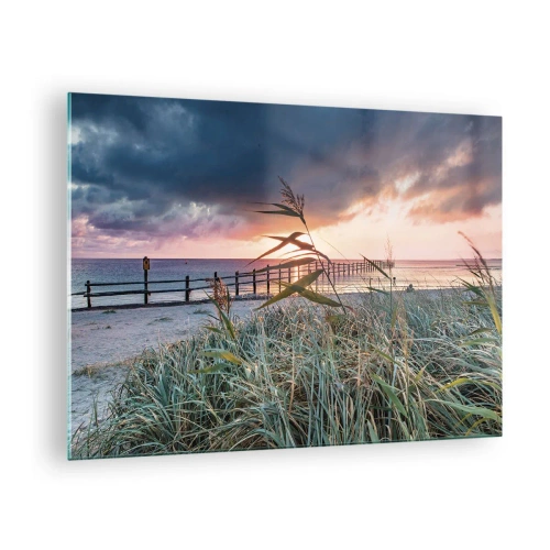 Quadro su vetro - La spiaggia al tramonto con vista sul molo, circondata dall'erba - 70x50cm - Non andrà via col vento - Decorazione murale moderna per soggiorno e camera da letto ARTTOR