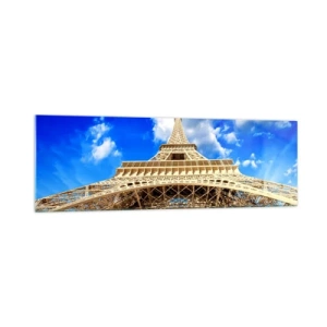 Quadro su vetro - La Torre Eiffel dal basso contro un cielo blu - 160x50cm - Toccare il cielo e le nuvole - Decorazione murale moderna per soggiorno e camera da letto ARTTOR