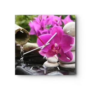 Orologio da parete - Orologio in Vetro - Orchidea viola, pietre e bambù con acqua in un ambiente rilassante - 30x30cm - E già ti riposi - Decorazione murale moderna per soggiorno e camera da letto ARTTOR