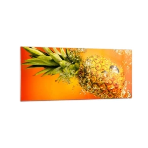 Quadro su vetro - Un ananas immerso nell'acqua su uno sfondo sfumato arancione. - 120x50cm - Succosa freschezza tropicale - Decorazione murale moderna per soggiorno e camera da letto ARTTOR