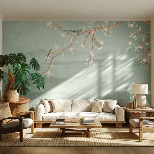 Fotomurali Premium Canvas - Un'immagine pittoresca di un ramo di albero fiorito con uccelli sullo sfondo di verdi colline. - 100x70cm - Eccoti primavera - Decorazione murale moderna per soggiorno e camera da letto ARTTOR