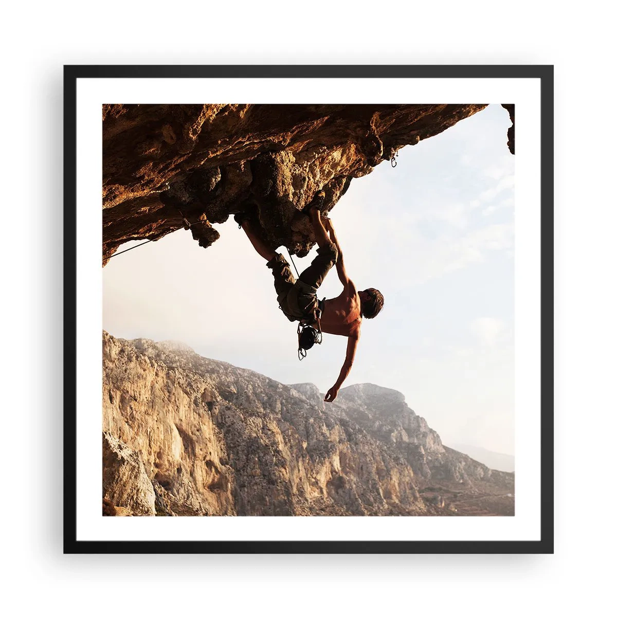 Poster in cornice nera - Il mondo ristretto in una mano sul bordo del masso - 60x60 cm