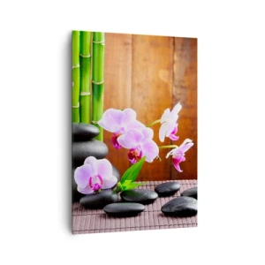 Quadro su tela - Stampe su Tela - Bambù in stile zen, pietre e orchidee rosa su uno sfondo di legno - 70x100cm - Scopri i piaceri dell'oriente - Decorazione murale moderna per soggiorno e camera da letto ARTTOR