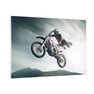 Quadro su vetro - Un motociclista esegue acrobazie in aria con le montagne sullo sfondo. - 100x70cm - No risk no fun - Decorazione murale moderna per soggiorno e camera da letto ARTTOR