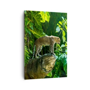 Quadro su tela - Stampe su Tela - Un leopardo in piedi su una roccia circondato da vegetazione tropicale - 70x100cm - A caccia? - Decorazione murale moderna per soggiorno e camera da letto ARTTOR