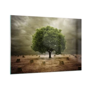 Quadro su vetro - Un albero verde circondato da tronchi contro un cielo cupo - 100x70cm - Ogni speranza - Decorazione murale moderna per soggiorno e camera da letto ARTTOR