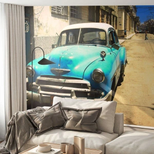 Fotomurali Premium Canvas - Un'auto d'epoca blu sulla strada in una giornata di sole - 100x70cm - Evviva Cuba! - Decorazione murale moderna per soggiorno e camera da letto ARTTOR