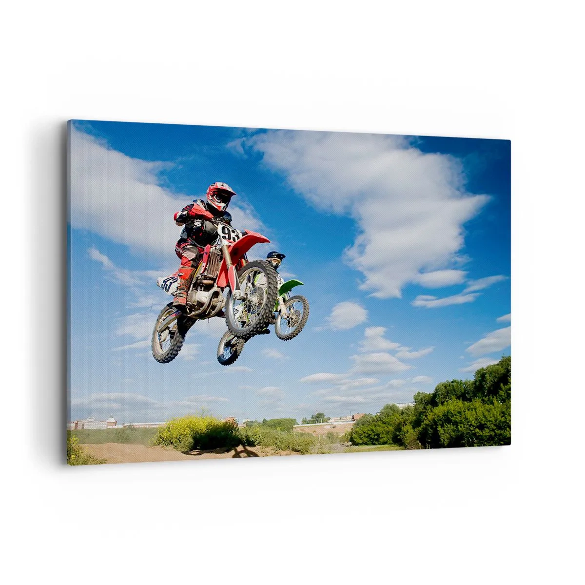 Quadro su tela - Stampe su Tela - Piloti di moto da cross in aria durante un salto - 100x70cm - Saltando sotto il cielo - Decorazione murale moderna per soggiorno e camera da letto ARTTOR
