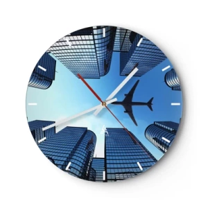 Orologio da parete - Orologio in Vetro - Un aereo sopra i moderni grattacieli contro un cielo blu - 30x30cm - Panorama dal canyon di vetro - Decorazione murale moderna per soggiorno, cucina e camera da letto ARTTOR
