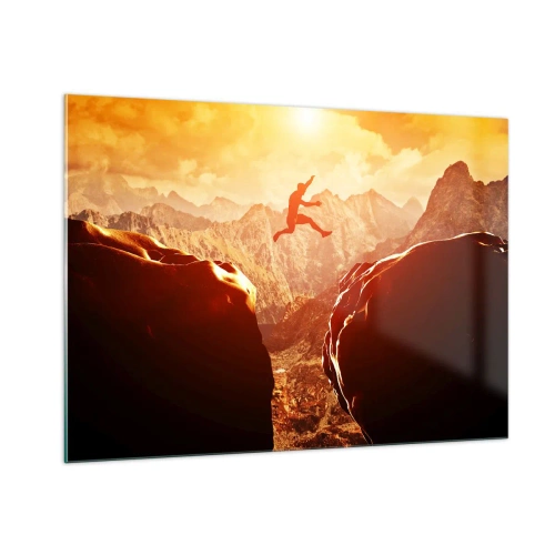 Quadro su vetro - Saltare un abisso in un paesaggio montano al tramonto - 100x70cm - Superare i confini - Decorazione murale moderna per soggiorno e camera da letto ARTTOR