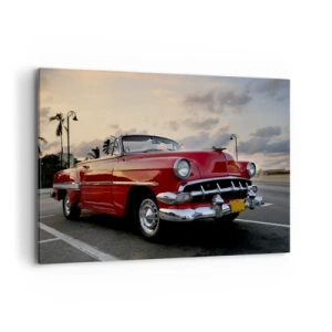 Quadro su tela - Stampe su Tela - Una decappottabile rossa classica parcheggiata tra le palme al tramonto. - 100x70cm - Il calore rosso dei tropici - Decorazione murale moderna per soggiorno e camera da letto ARTTOR