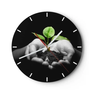 Orologio da parete - Orologio in Vetro - Un germoglio verde tenuto tra le mani su uno sfondo nero - 30x30cm - Amo la natura, la proteggo - Decorazione murale moderna per soggiorno, cucina e camera da letto ARTTOR