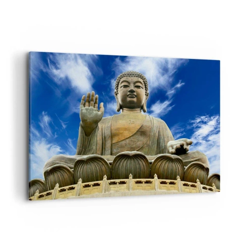 Quadro su tela - Stampe su Tela - Una statua monumentale del Buddha contro un cielo azzurro con nuvole - 100x70cm - Vivere senza paura - Decorazione murale moderna per soggiorno e camera da letto ARTTOR